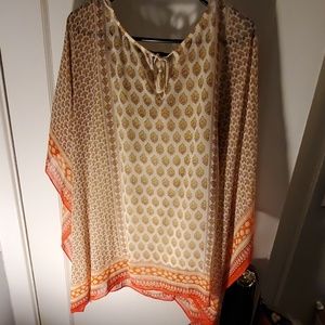 A tan and orange top